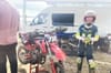 Shay Flanagan with his bike, at a track near Newry. Photo by Sunni Bean.