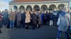 A crowd paying respect to Bill Abom outside the church of the Good Shepherd in Churchtown