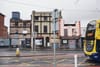 A row of derelict buildings.