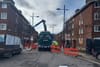 Gates go up across the roadway at one end of Hardwicke Street, in the north inner-city