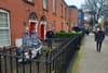 In Phibsboro, three boats sail alongside the North Circular Road