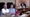 Councillors and council managers at a council meeti