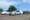 Cars on the road in an urban area.