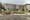 An image of Diamond Park, with two cones and evidence of construction work. Dug up ground and slabs of concrete in the foregr