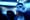 A blued-toned image, with a close up of a male face.